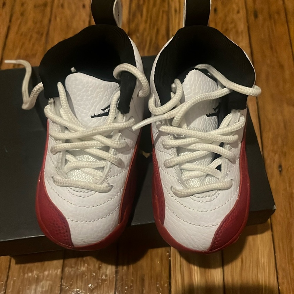 Red and white Jordan 12 worn few times comes in box good condition